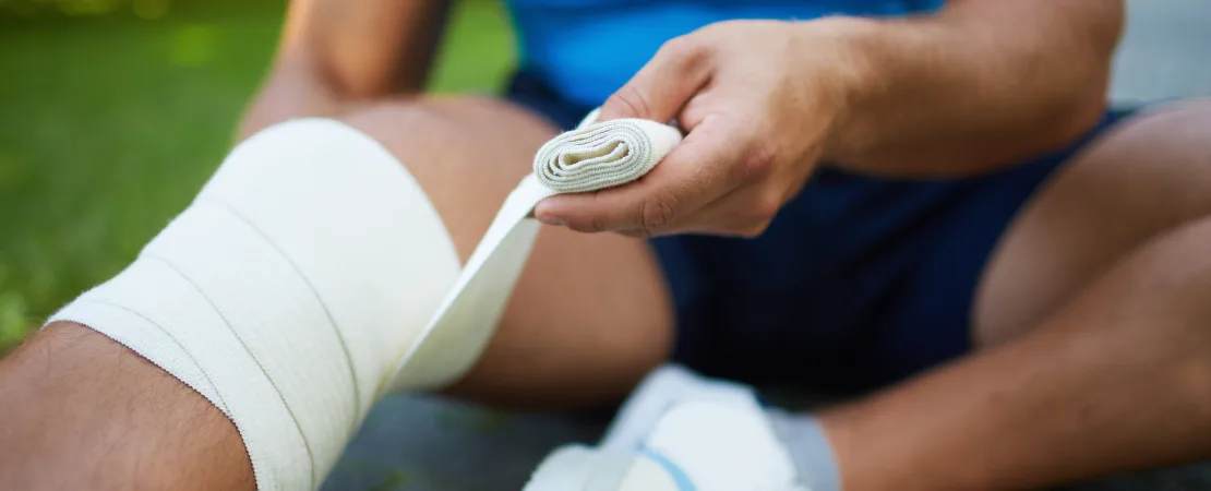 Registered physiotherapist at Physiocare Ottawa assessing an athlete's movement patterns during sport-specific fatigue testing for injury prevention